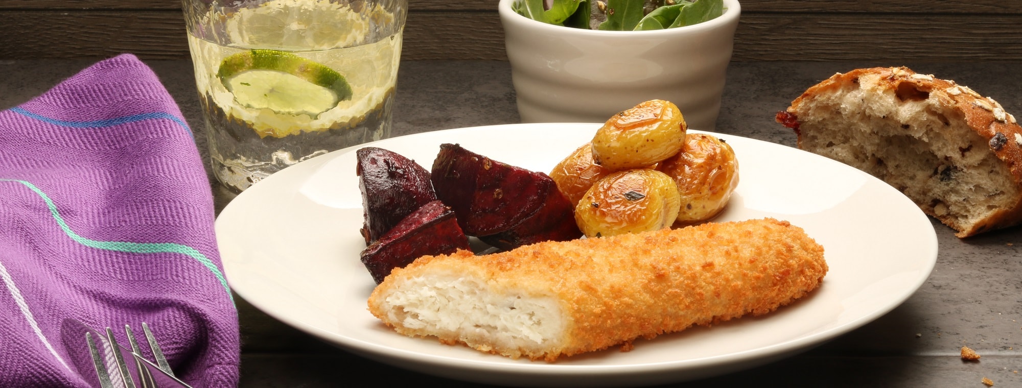 breaded haddock with roasted baby potatoes and beetroot